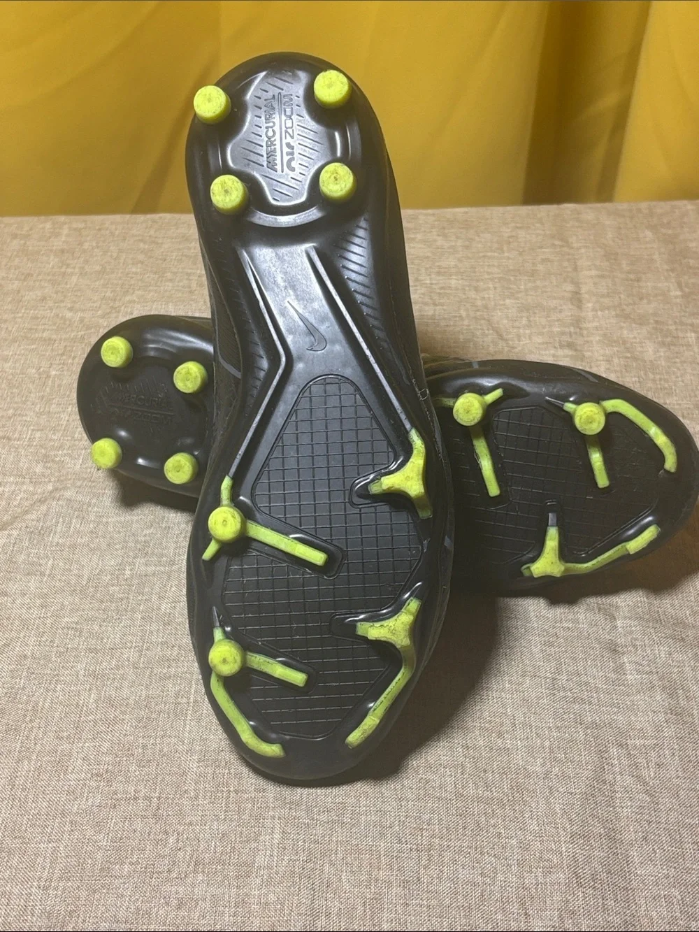Kid’s Black Athletic Slip-On Cleats with Neon Green Lining